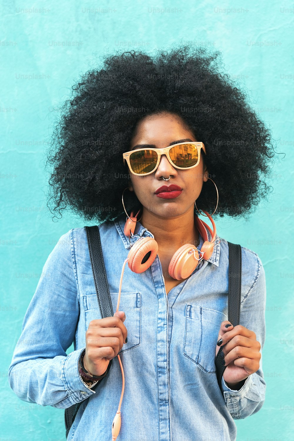 Portrait of beautiful afro american woman in the street.