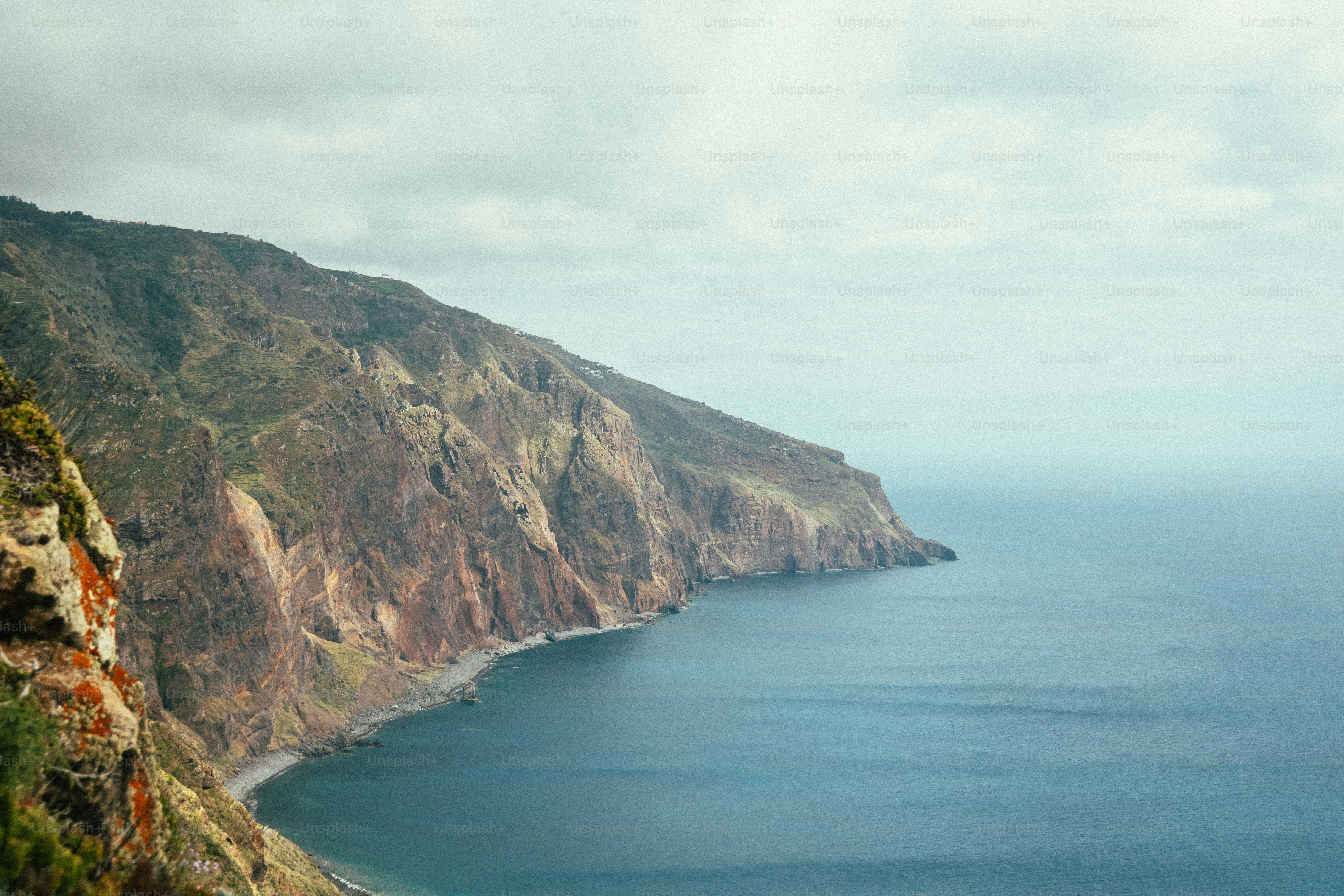 a view of the ocean from the top of a mountain
