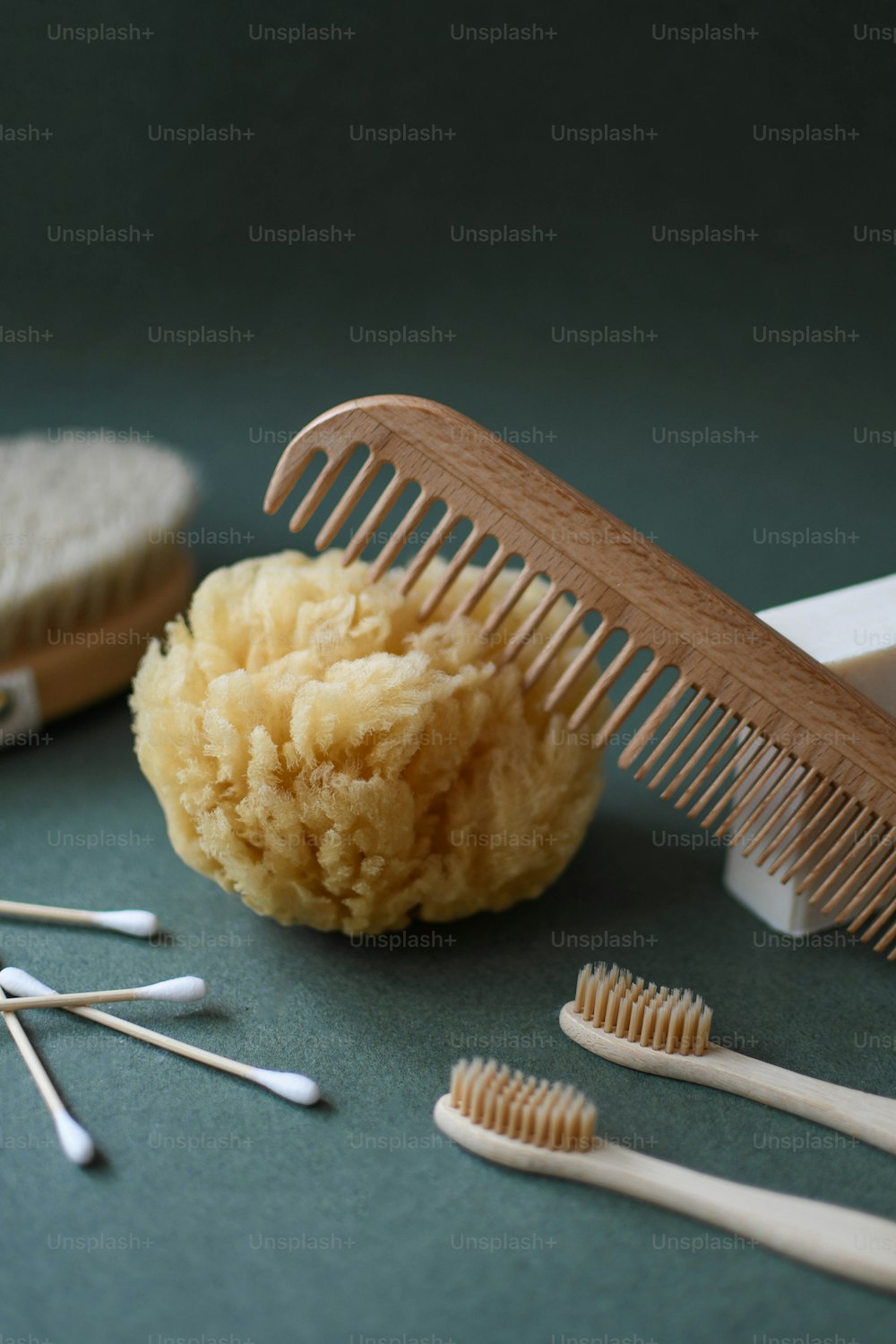 a comb, brush, and other items on a table
