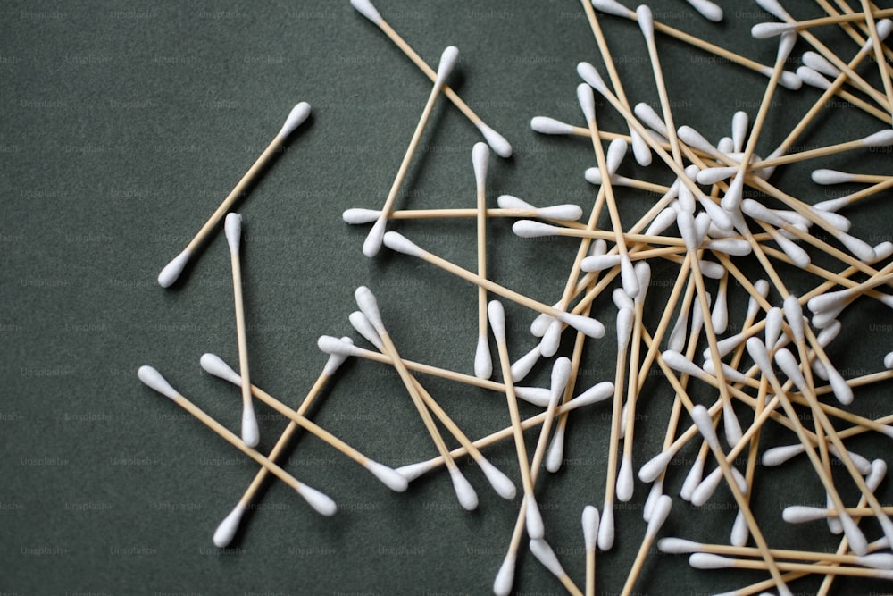 a pile of toothpicks sitting on top of a table