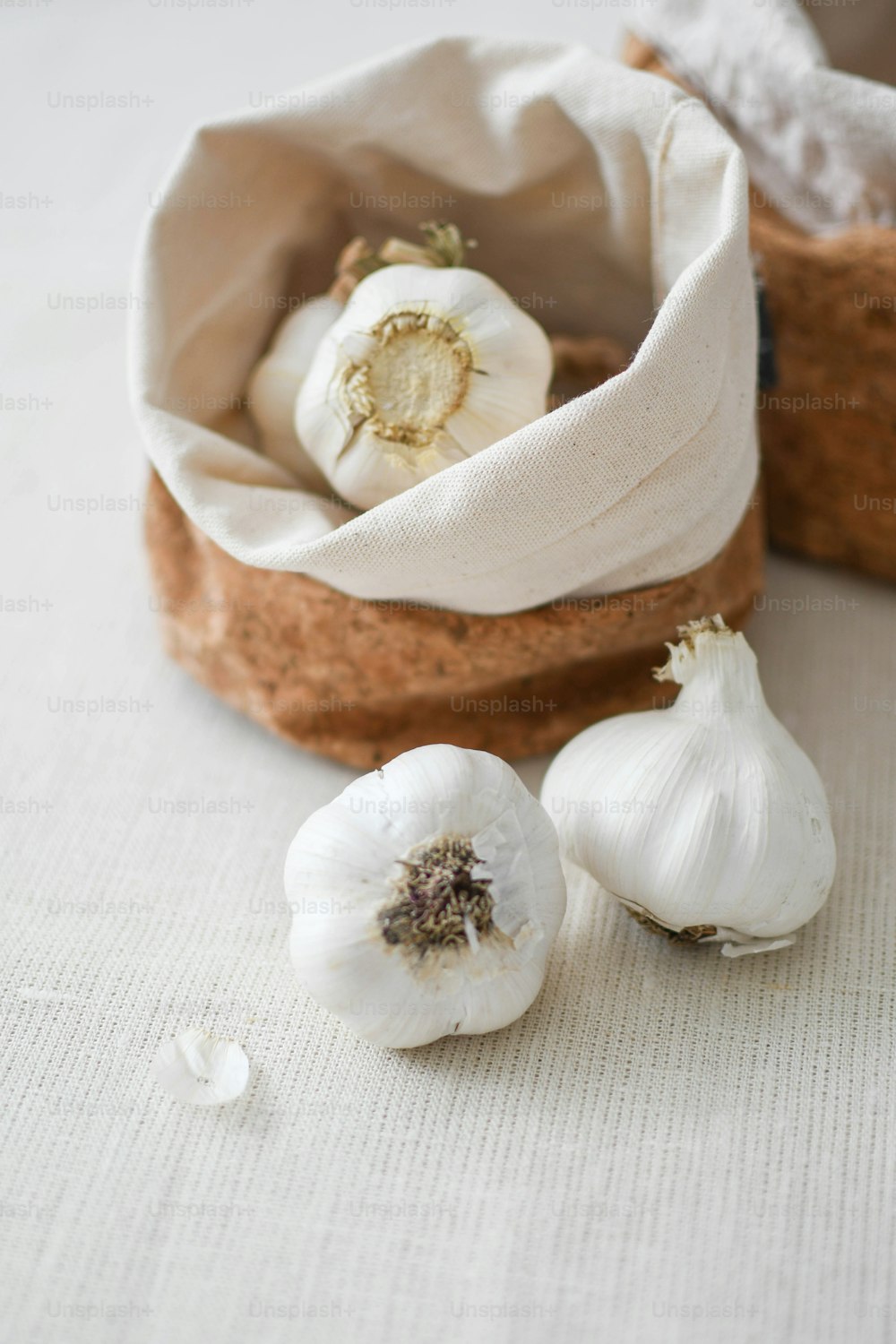 a bag of garlic sitting on top of a table