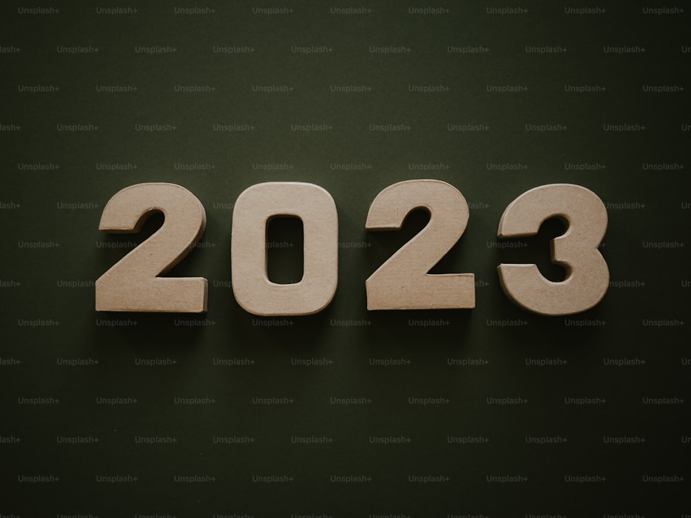 a number of wooden letters that spell out the year 2013 - 2013