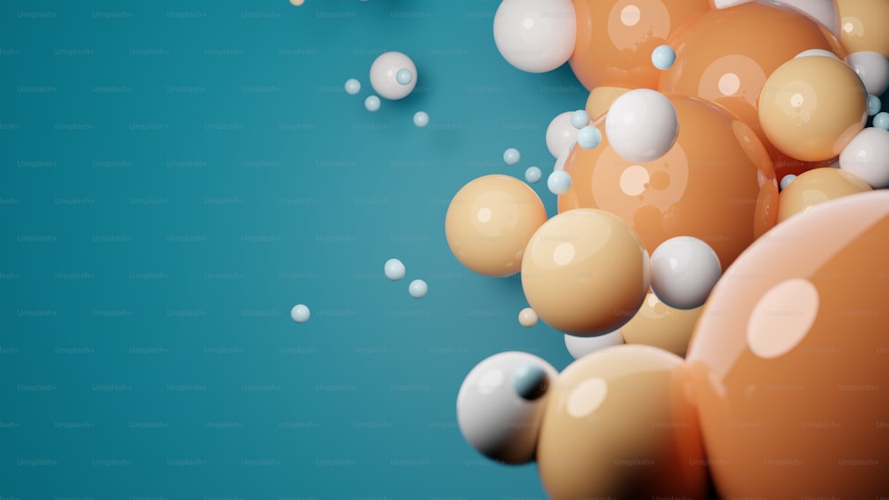 um monte de bolhas flutuando em cima de uma superfície azul