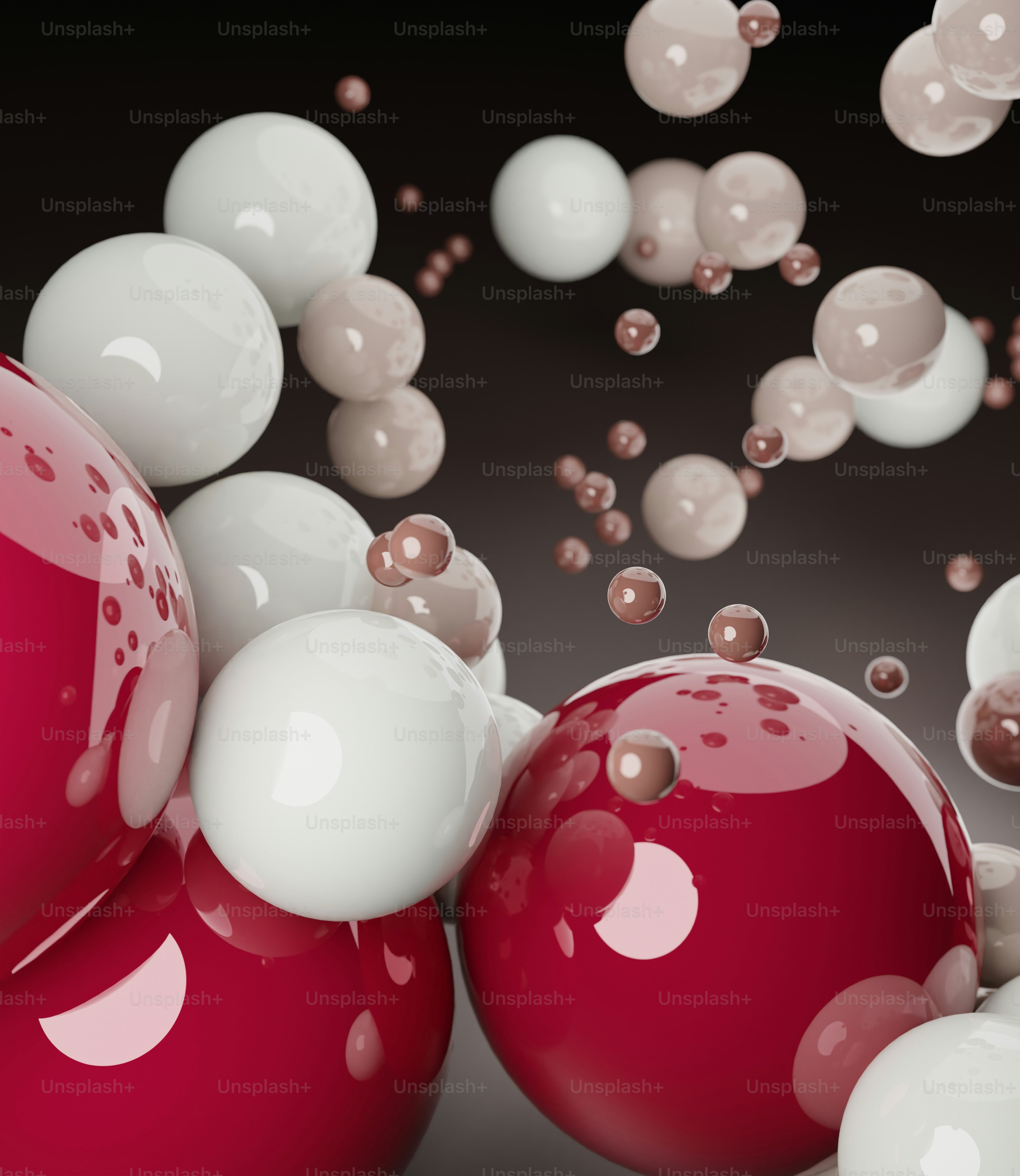 a group of red and white balls floating in the air