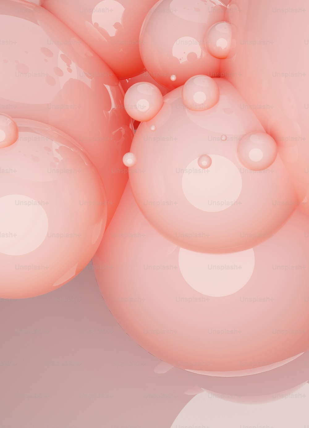 a close up of a bunch of pink bubbles
