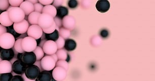 a bunch of black and pink balls on a pink background