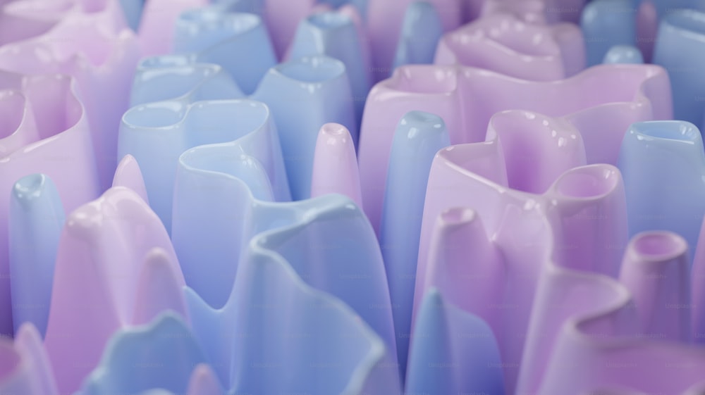 a close up of many different colored vases