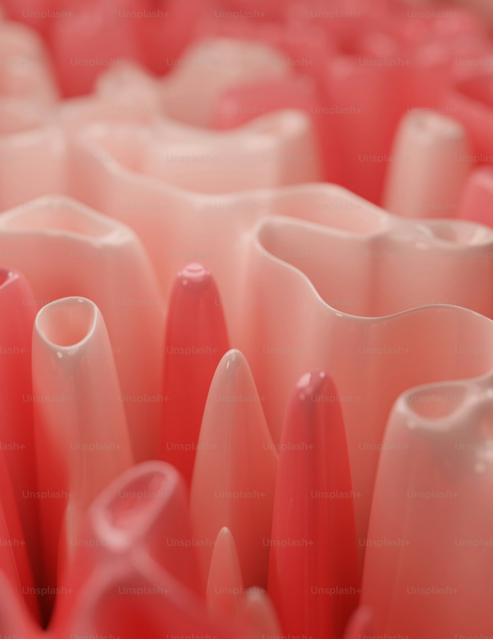 a close up of a bunch of pink vases