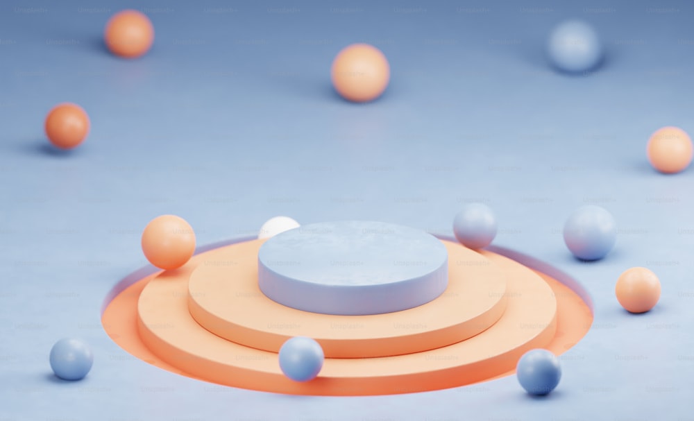 um grupo de bolas laranjas e azuis em uma superfície azul