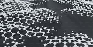 a close up of a black surface with white dots