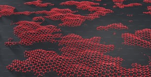 a bunch of red bubbles floating on top of a black surface