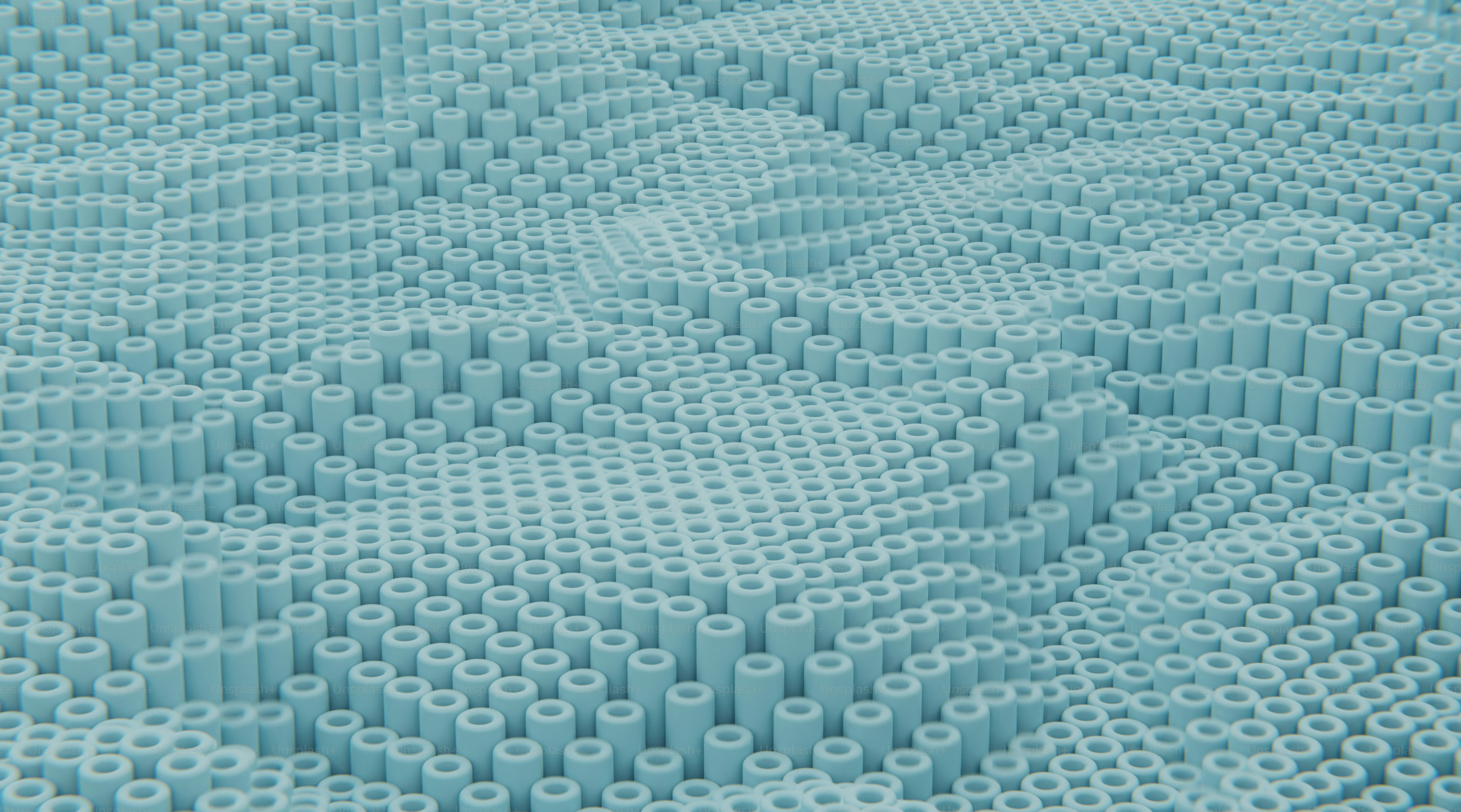 a large amount of plastic tubes are arranged in a pattern