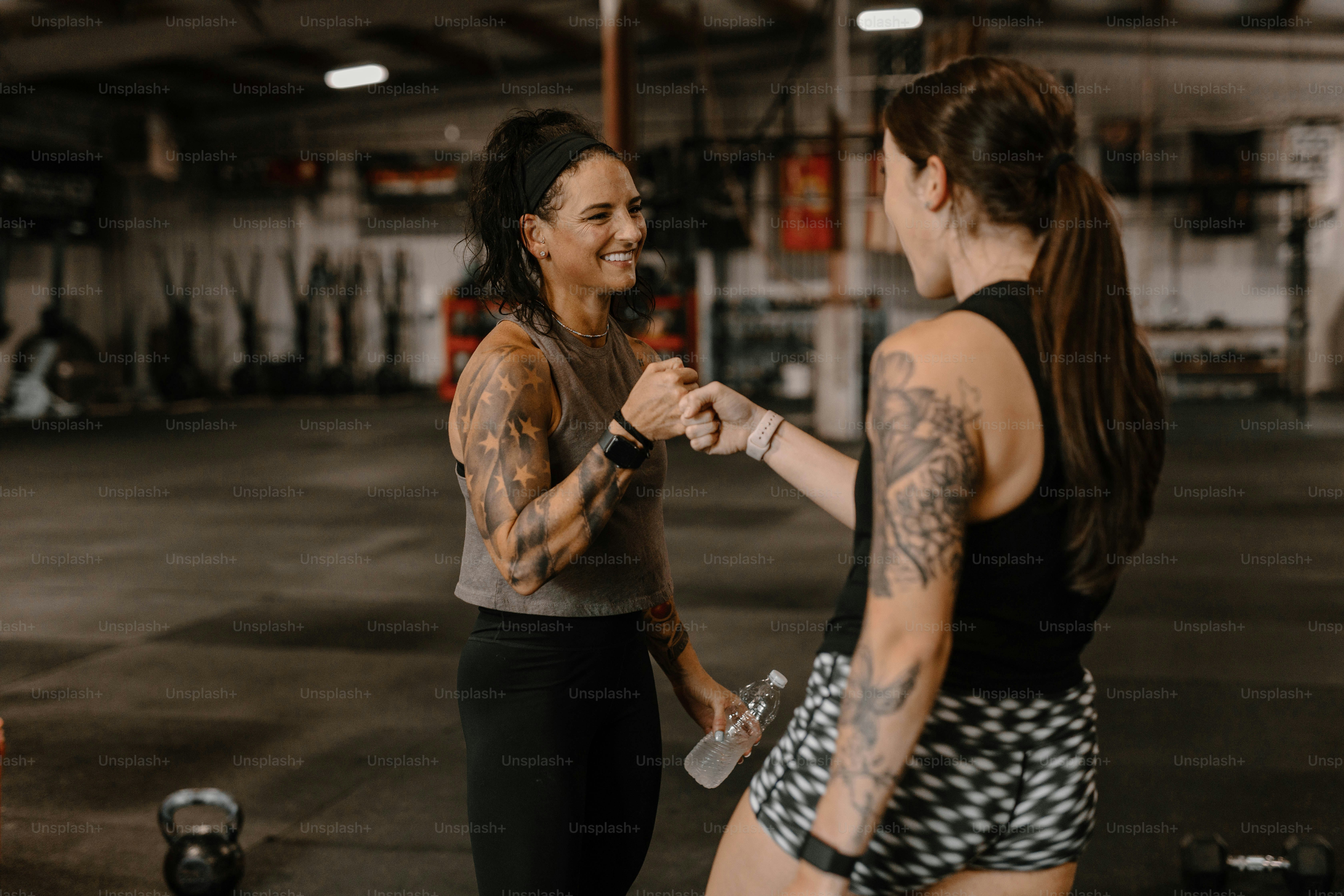 a couple of women standing next to each other