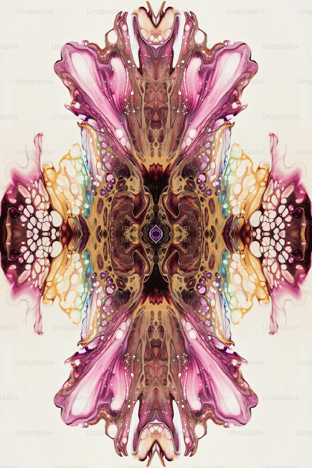 an abstract image of a flower in pink, yellow and brown