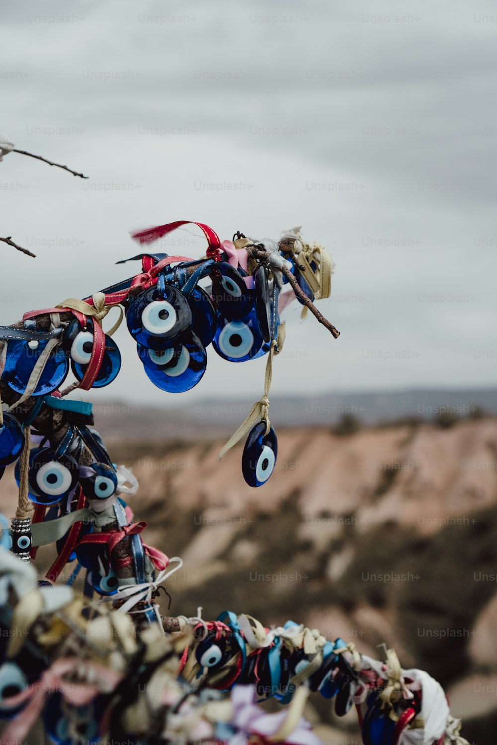 a bunch of different kinds of shoes hanging from a line