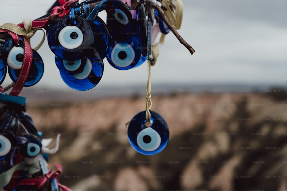 a bunch of evil eyes hanging from a string