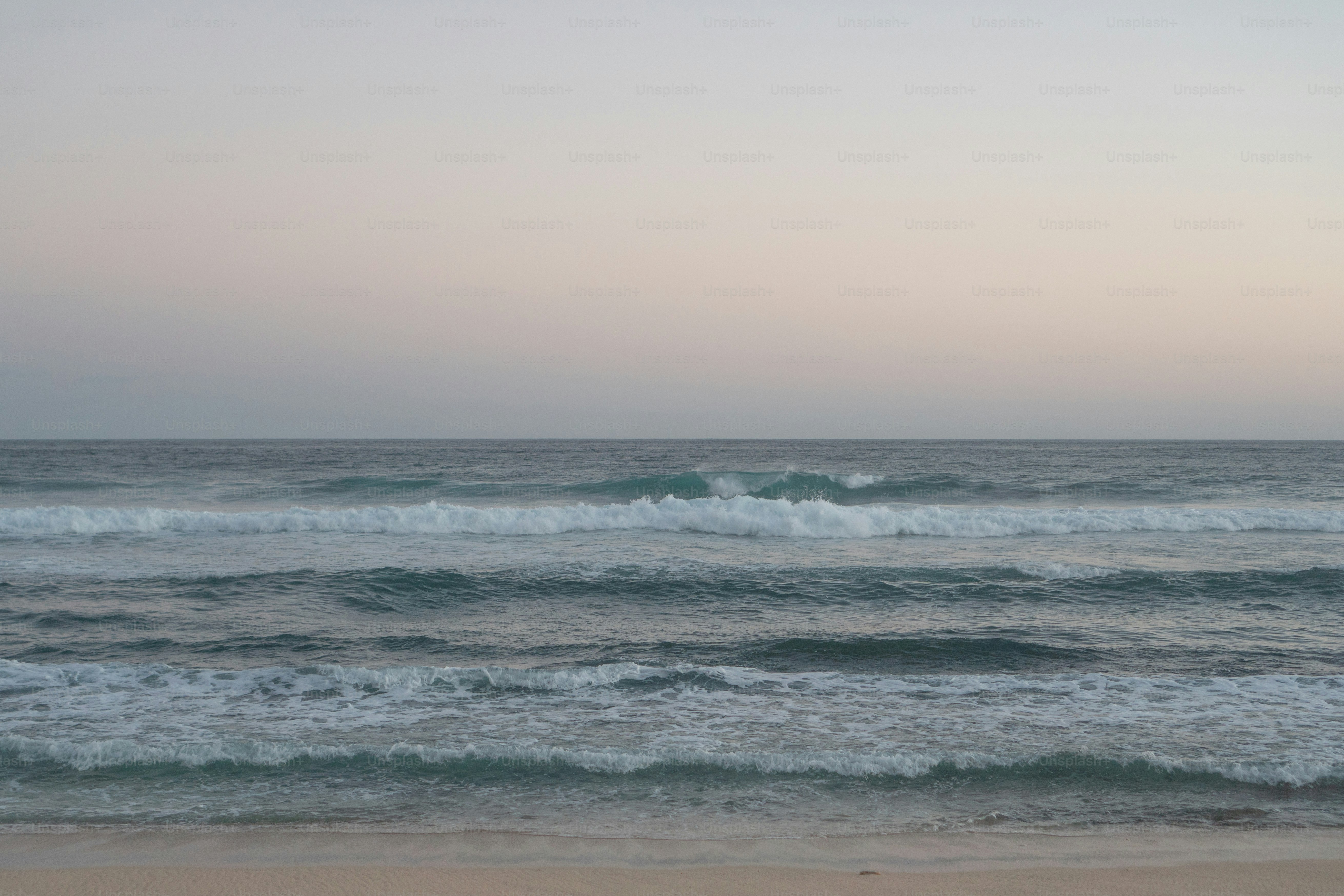 a view of the ocean from a beach