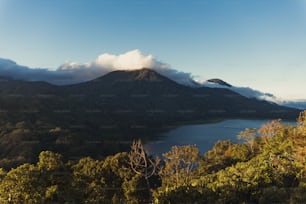 a mountain with a lake in the foreground