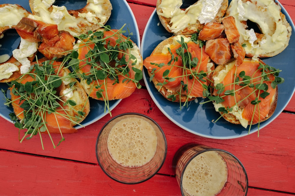 two plates of food on a red table