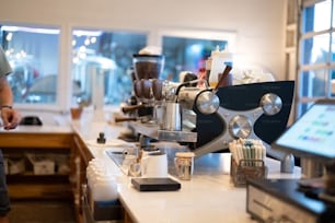 a coffee machine sitting on top of a white counter