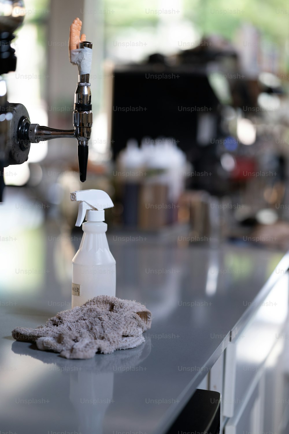 a white spray bottle sitting on top of a counter