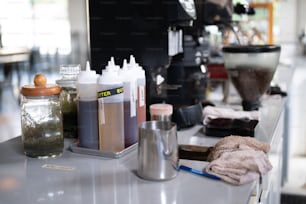 a kitchen counter with a variety of items on it