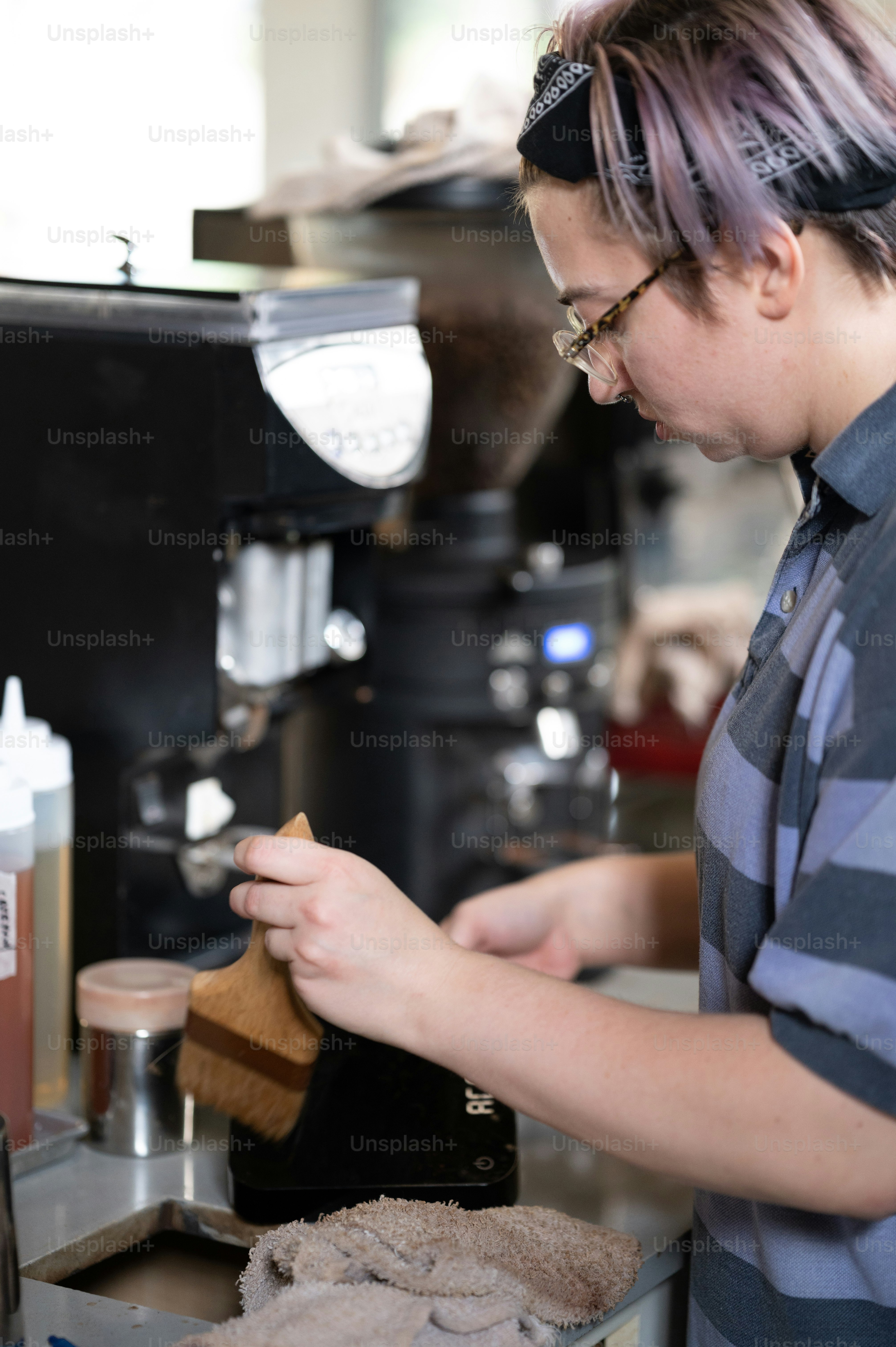 a woman in a striped shirt is making something