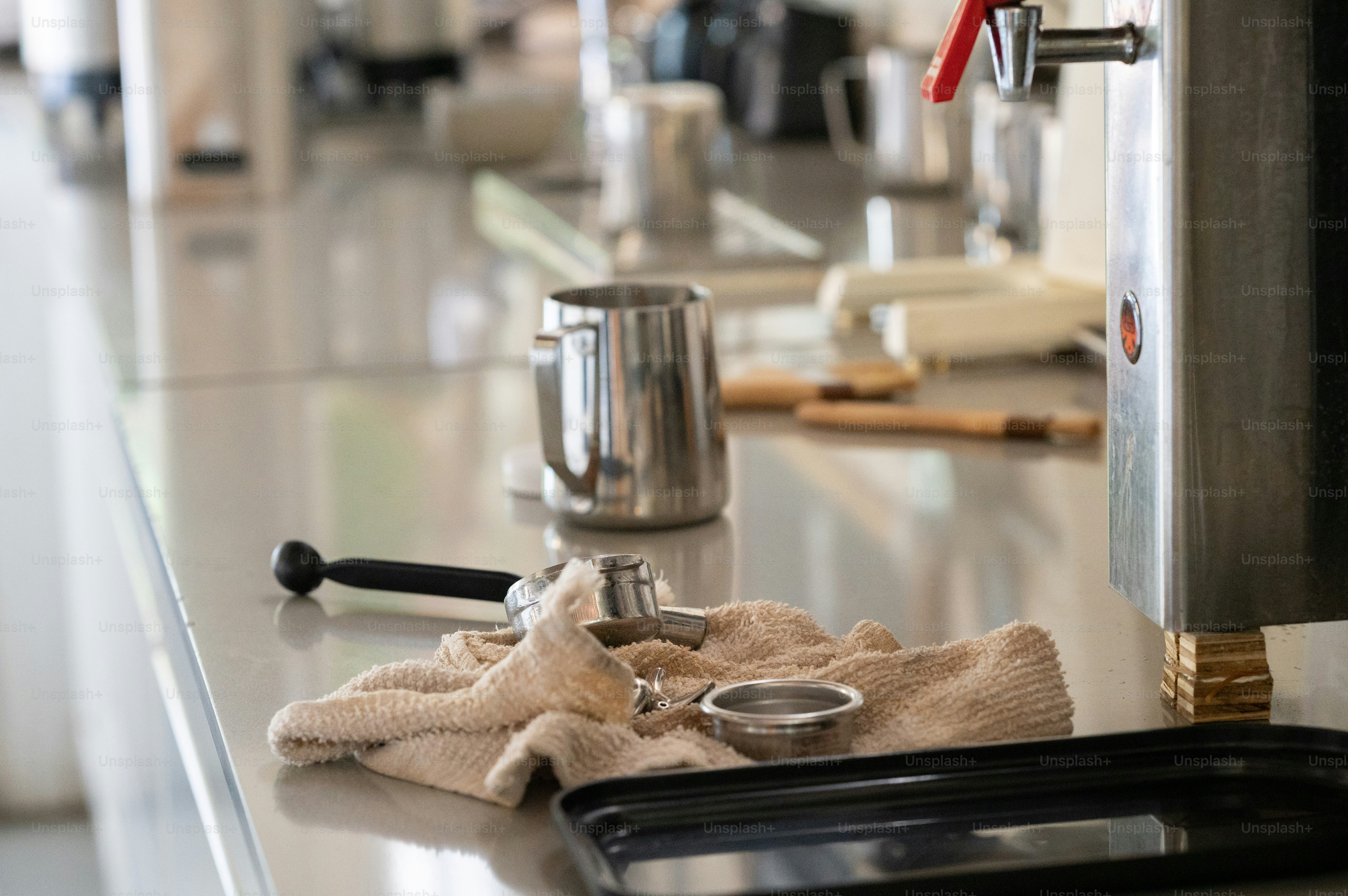 a kitchen counter with a pair of scissors on it