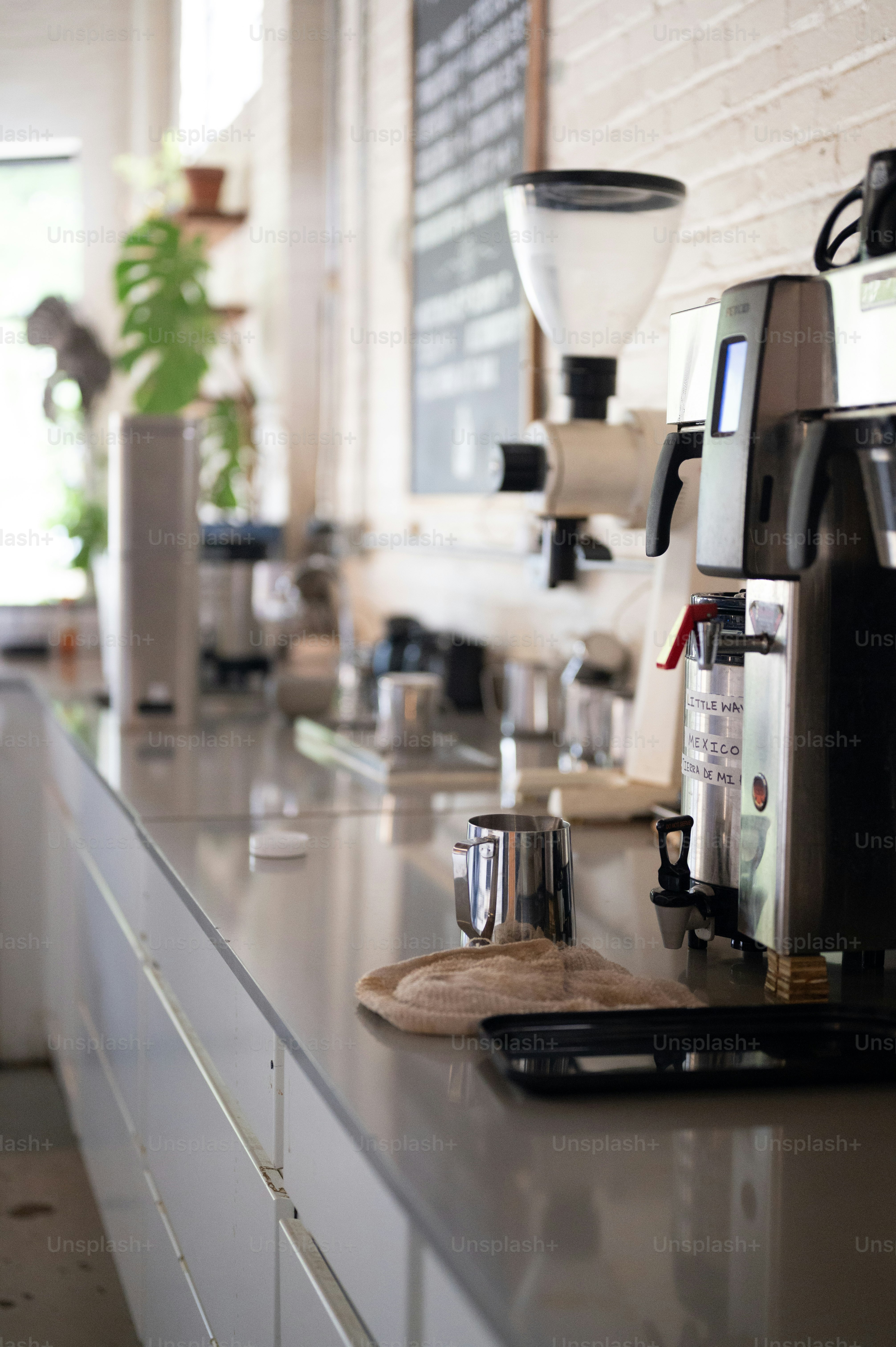 A coffee machine sitting on top of a counter photo – Restaurant Image ...
