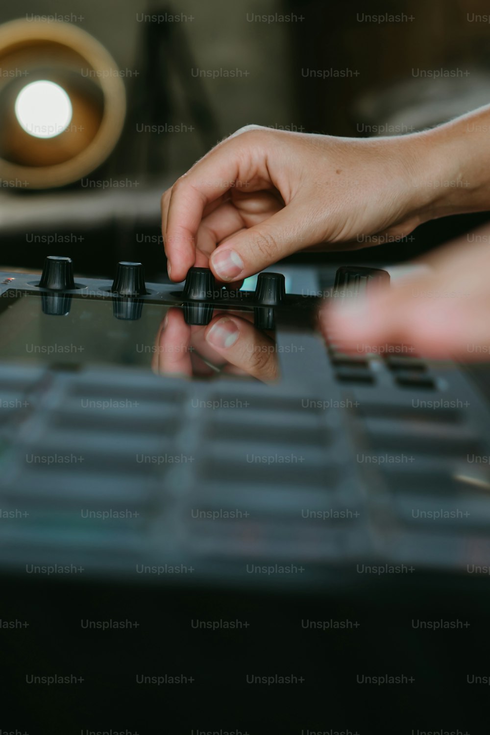 a person typing on a keyboard with their hands