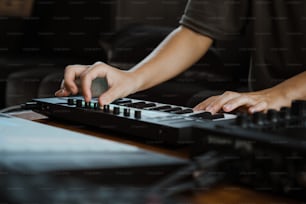 a person typing on a keyboard with their hands