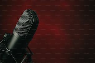 a close up of a microphone with a red background