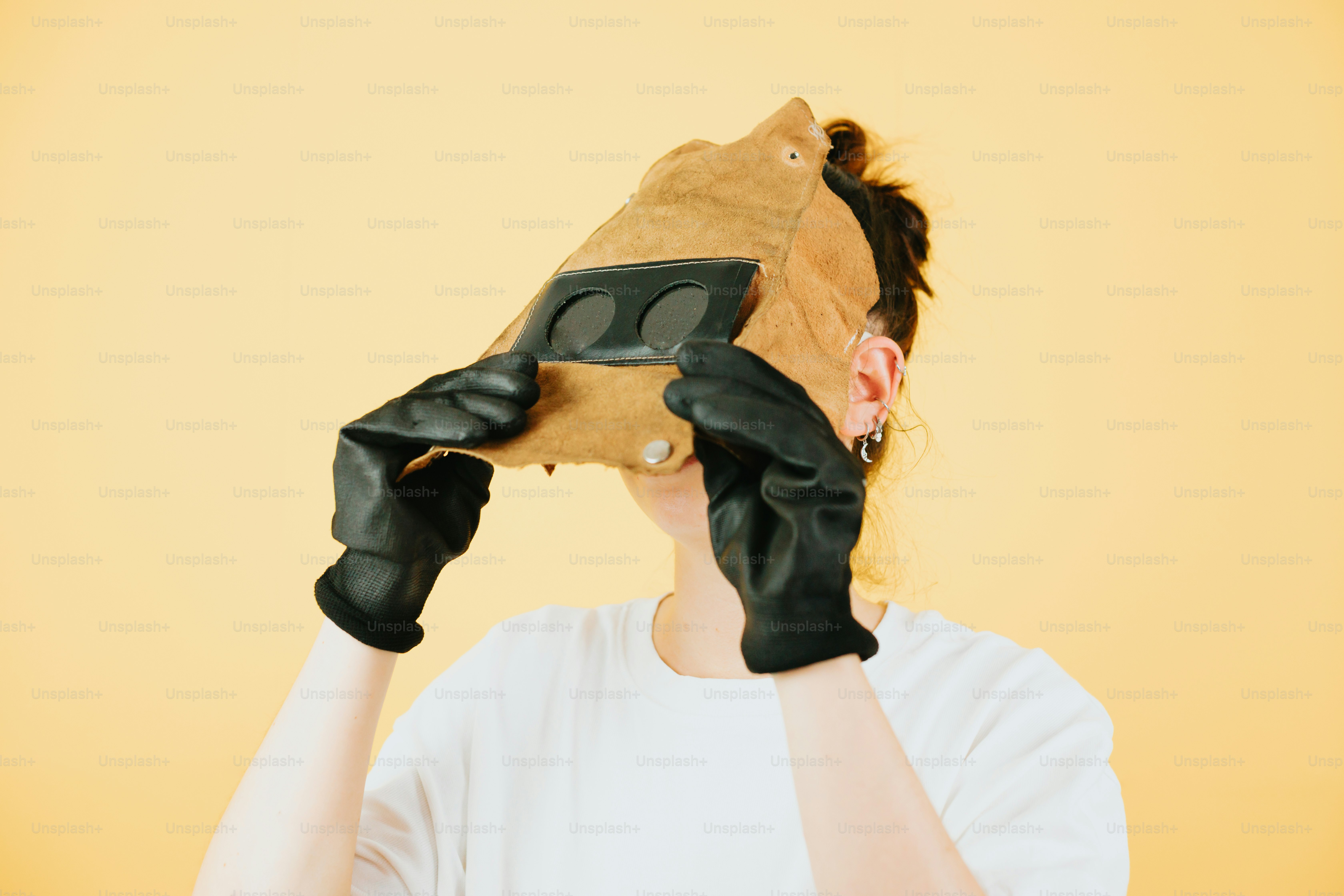 a woman holding a cell phone up to her face