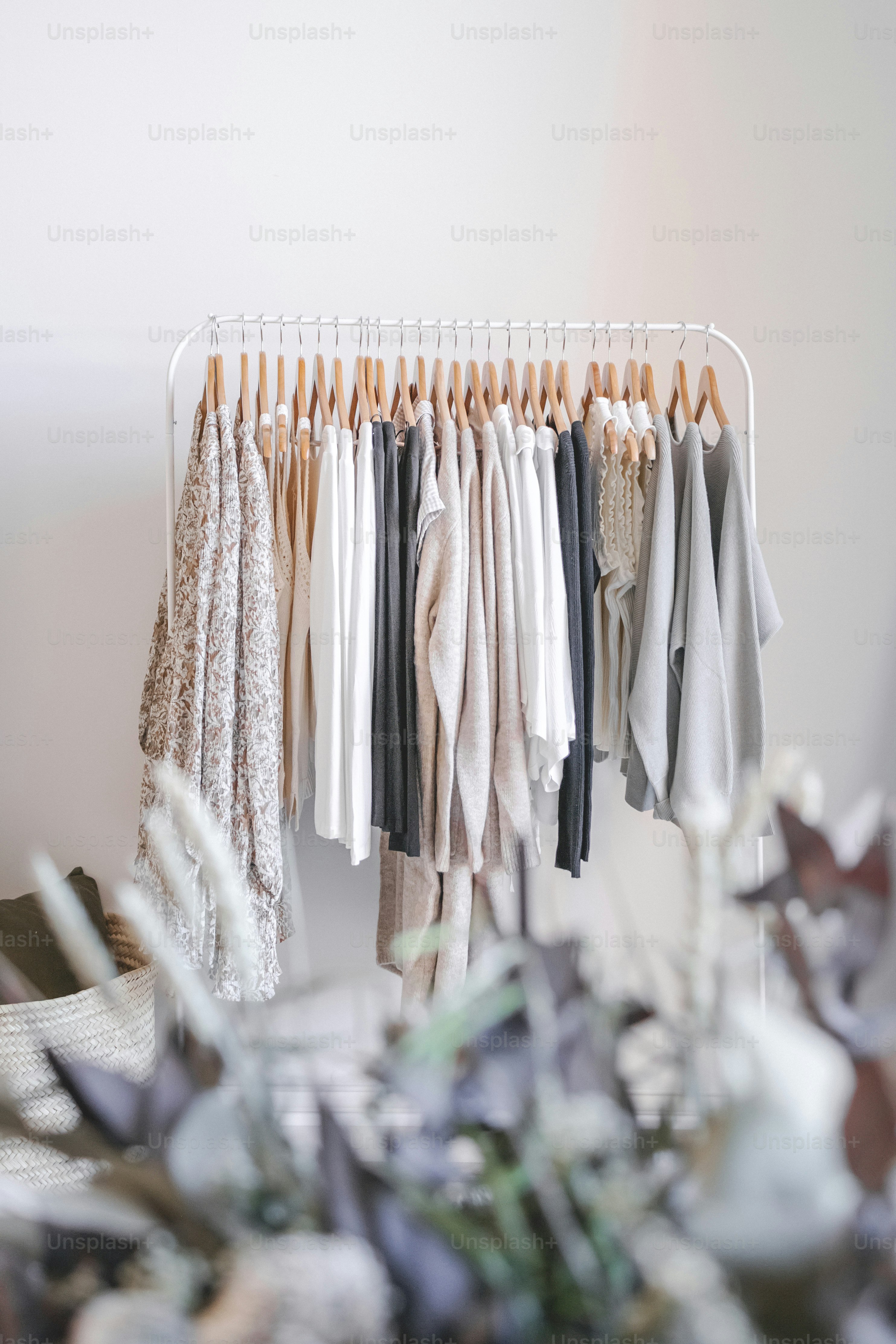 A rack of clothes hanging on a clothes line photo Fashion Image on