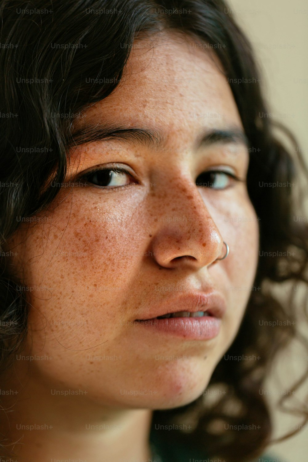 a close up of a person with freckles on her face