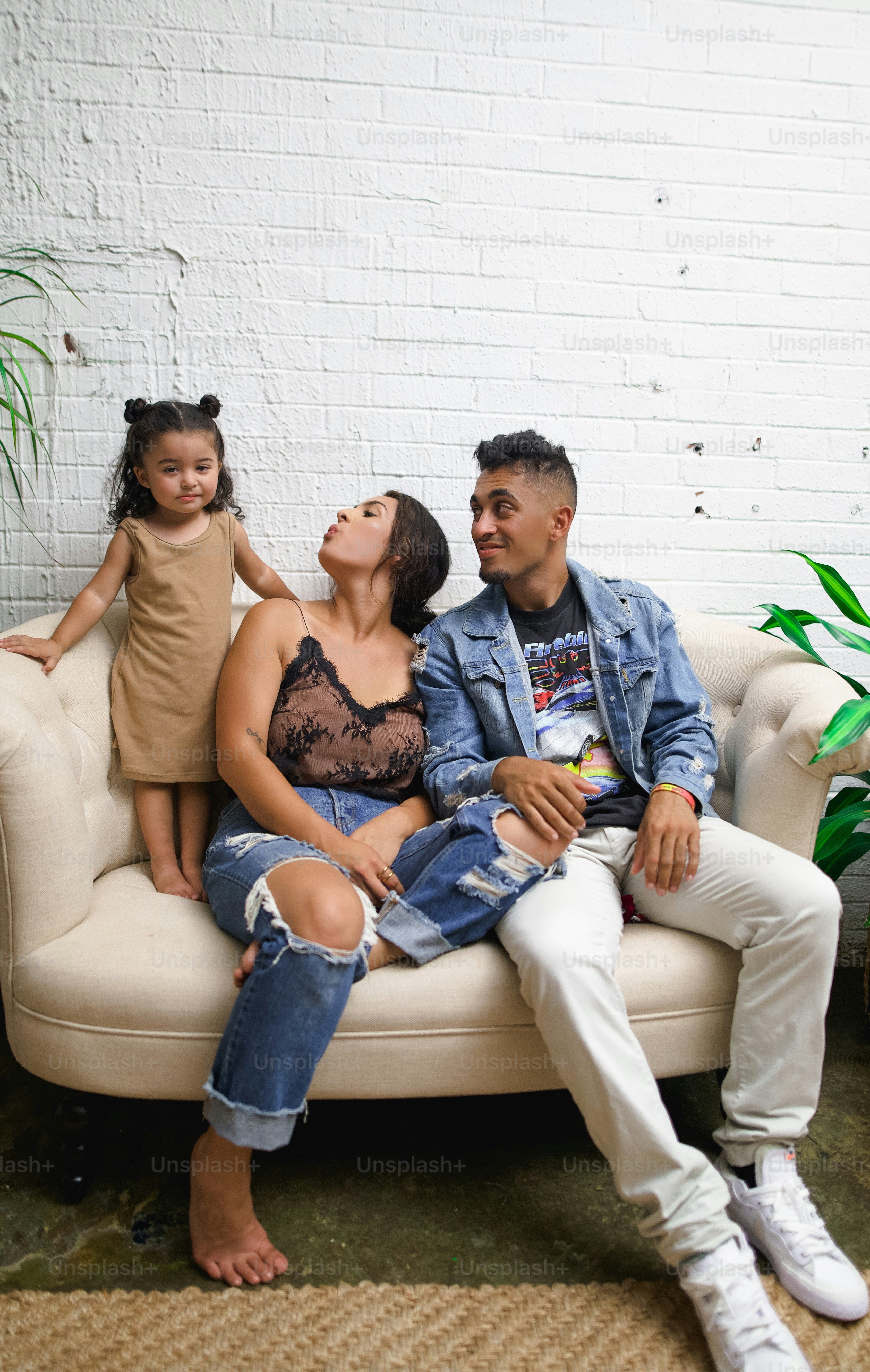 a man and a woman sitting on a couch