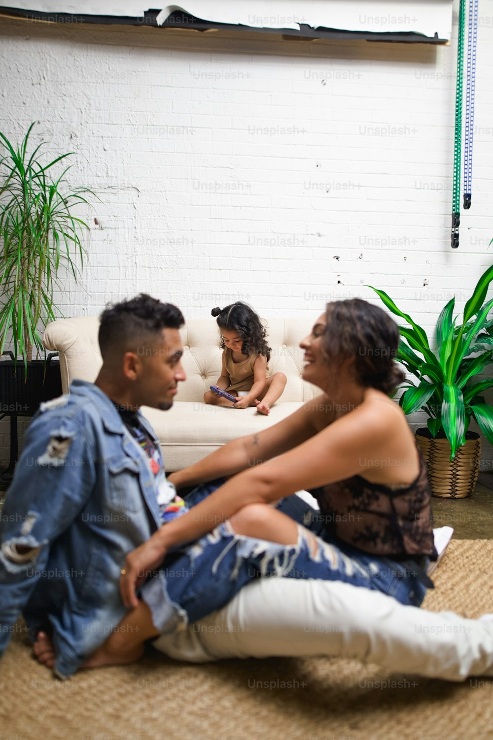 a man and a woman sitting on a couch