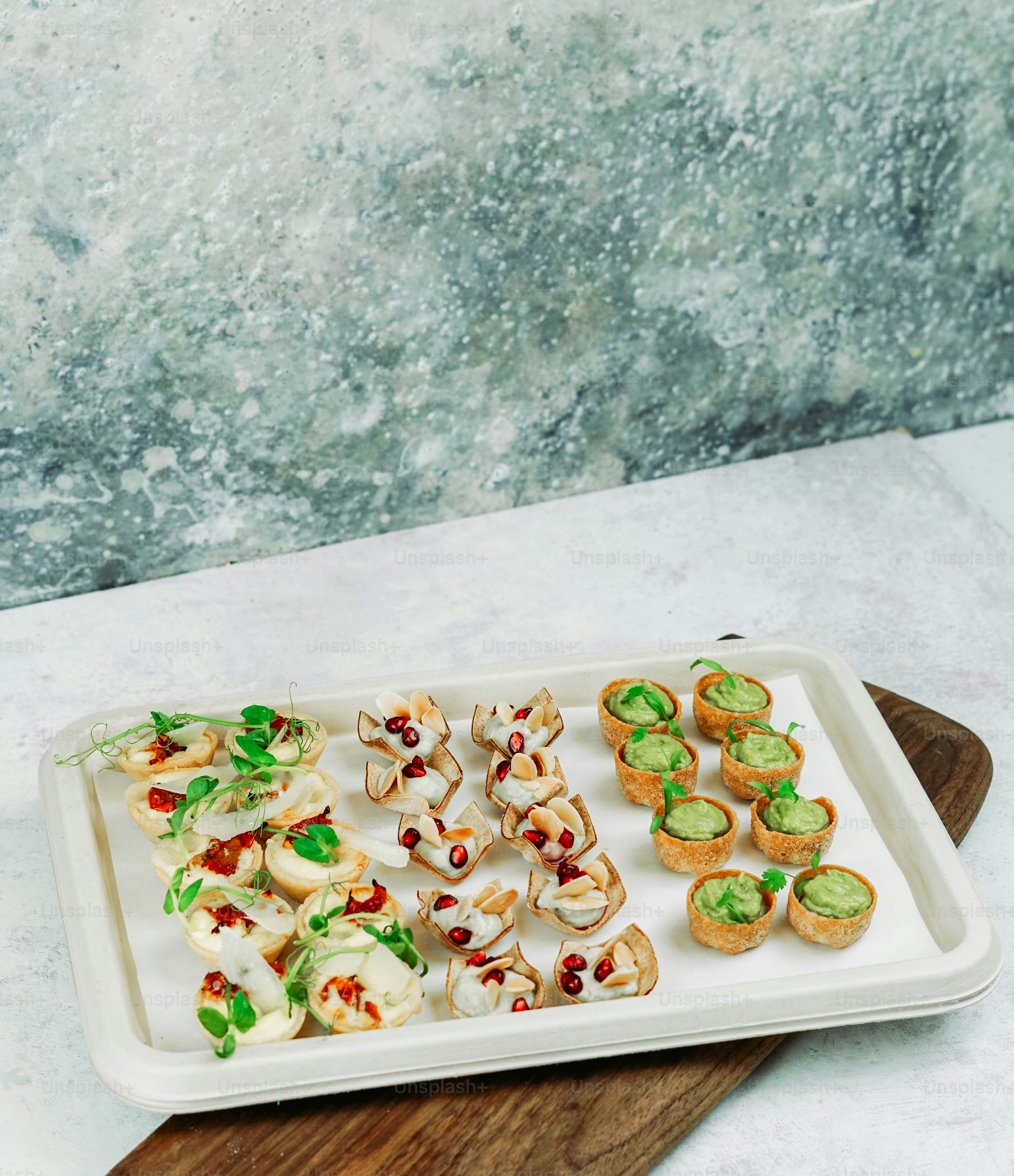 A tray of appetizers on a table photo – Platter Image on Unsplash