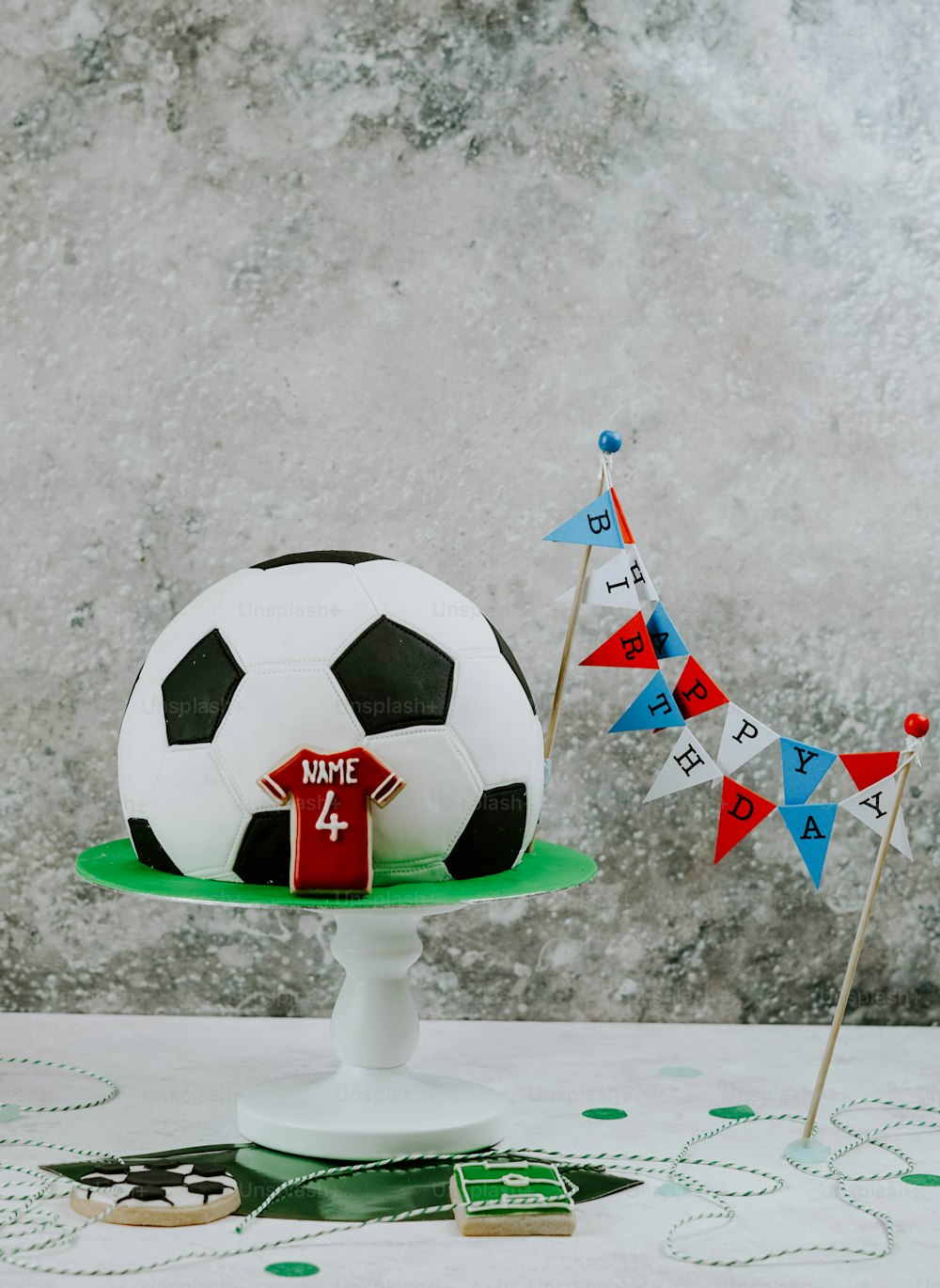 a cake with a soccer ball on top of it