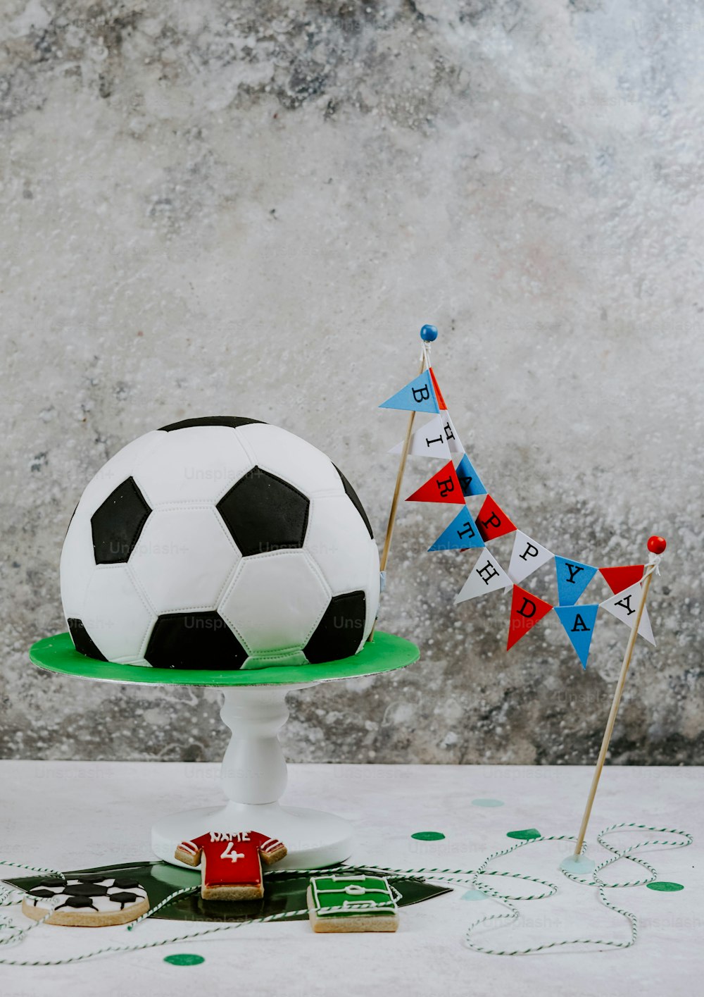 a cake with a soccer ball on top of it