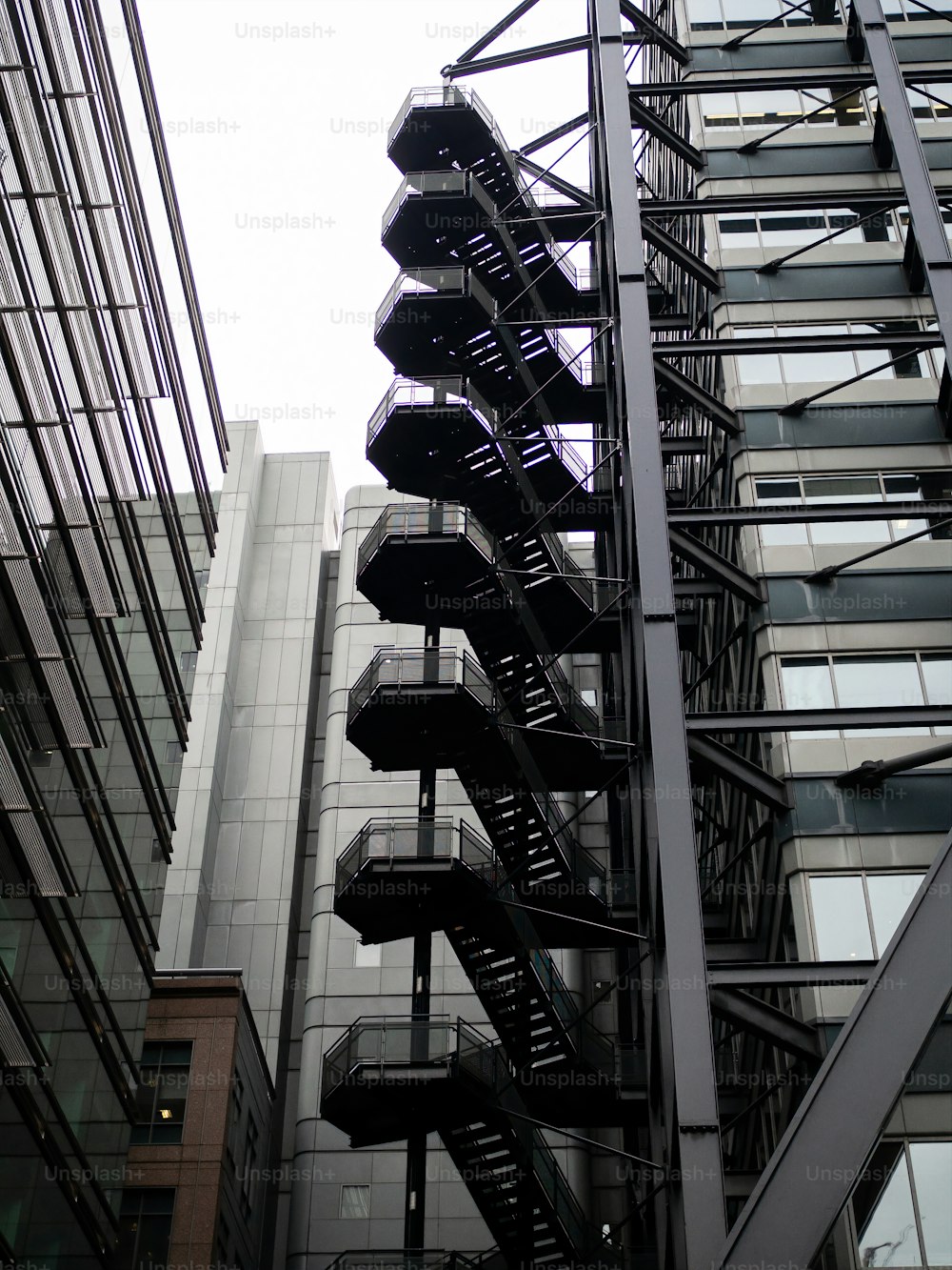 a fire escape next to a tall building