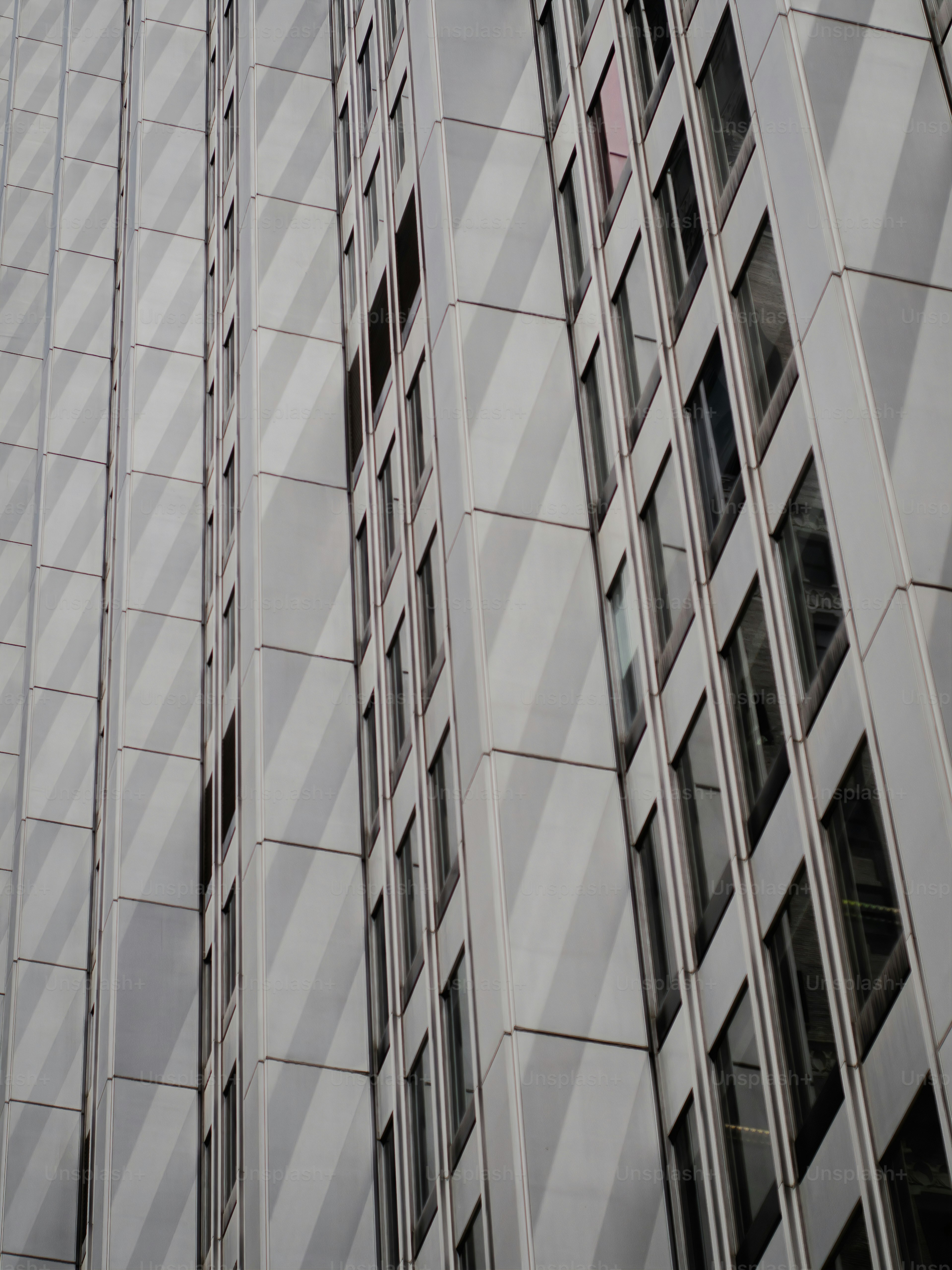 a close up of a tall building with many windows