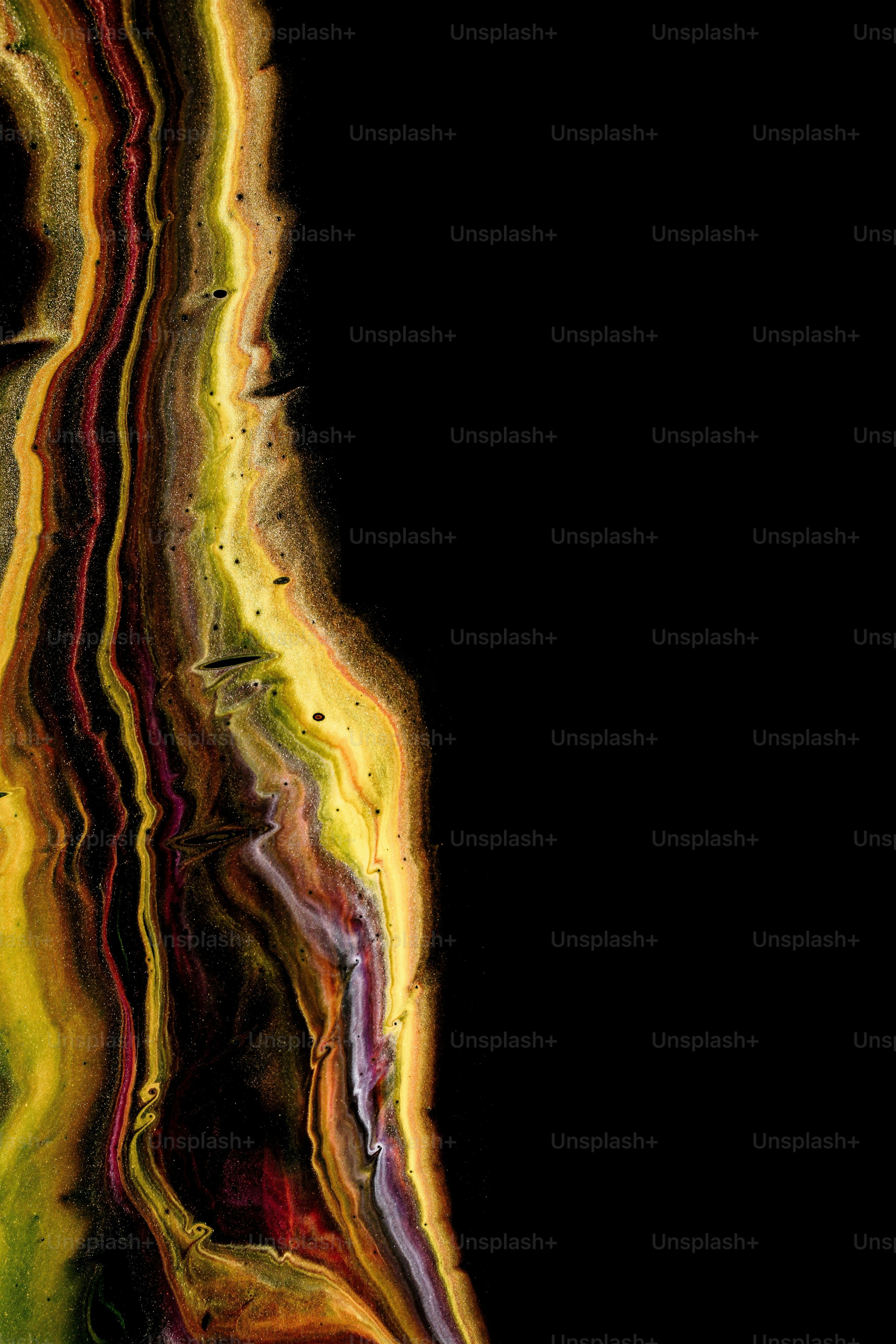 a black background with multicolored lines on it