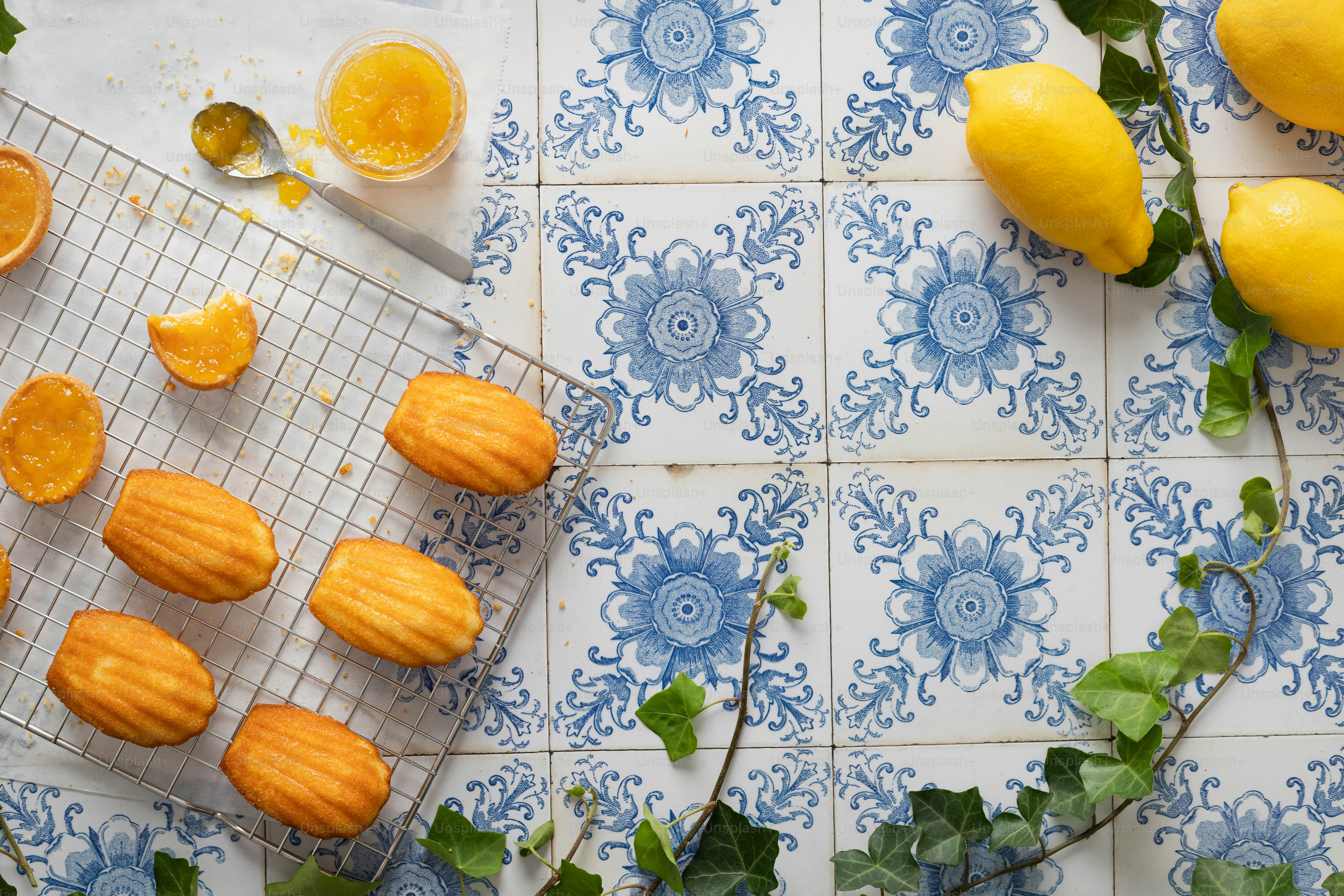 a bunch of oranges that are on a rack