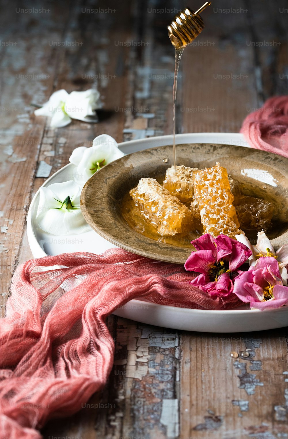 a plate of food on a wooden table