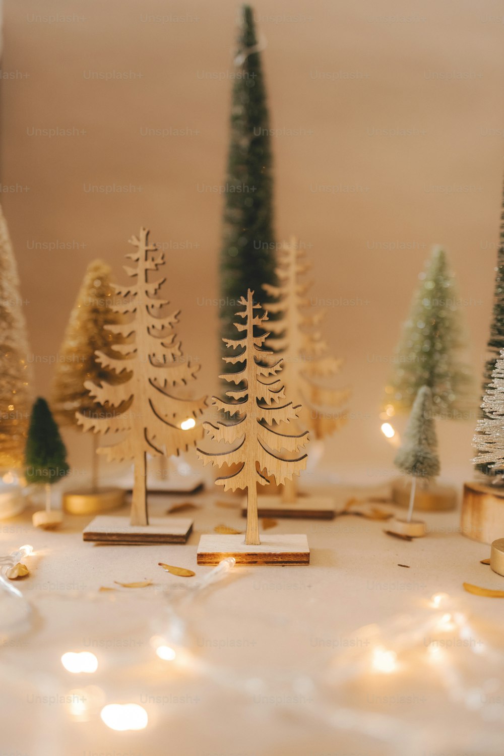 a group of small trees sitting on top of a table