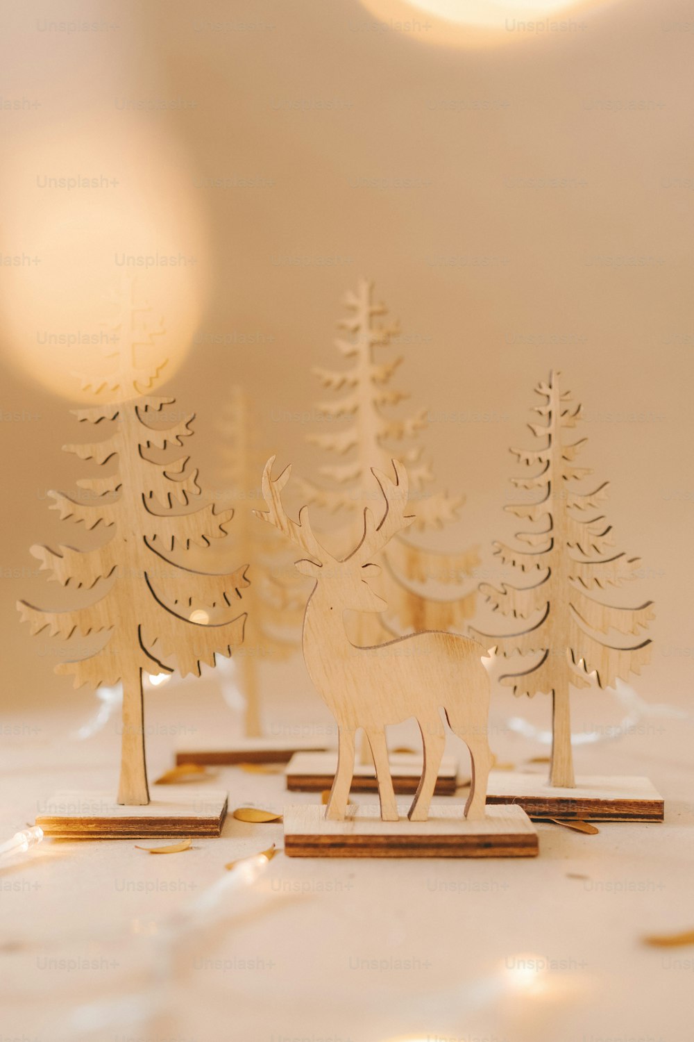 a group of wooden deer standing next to each other