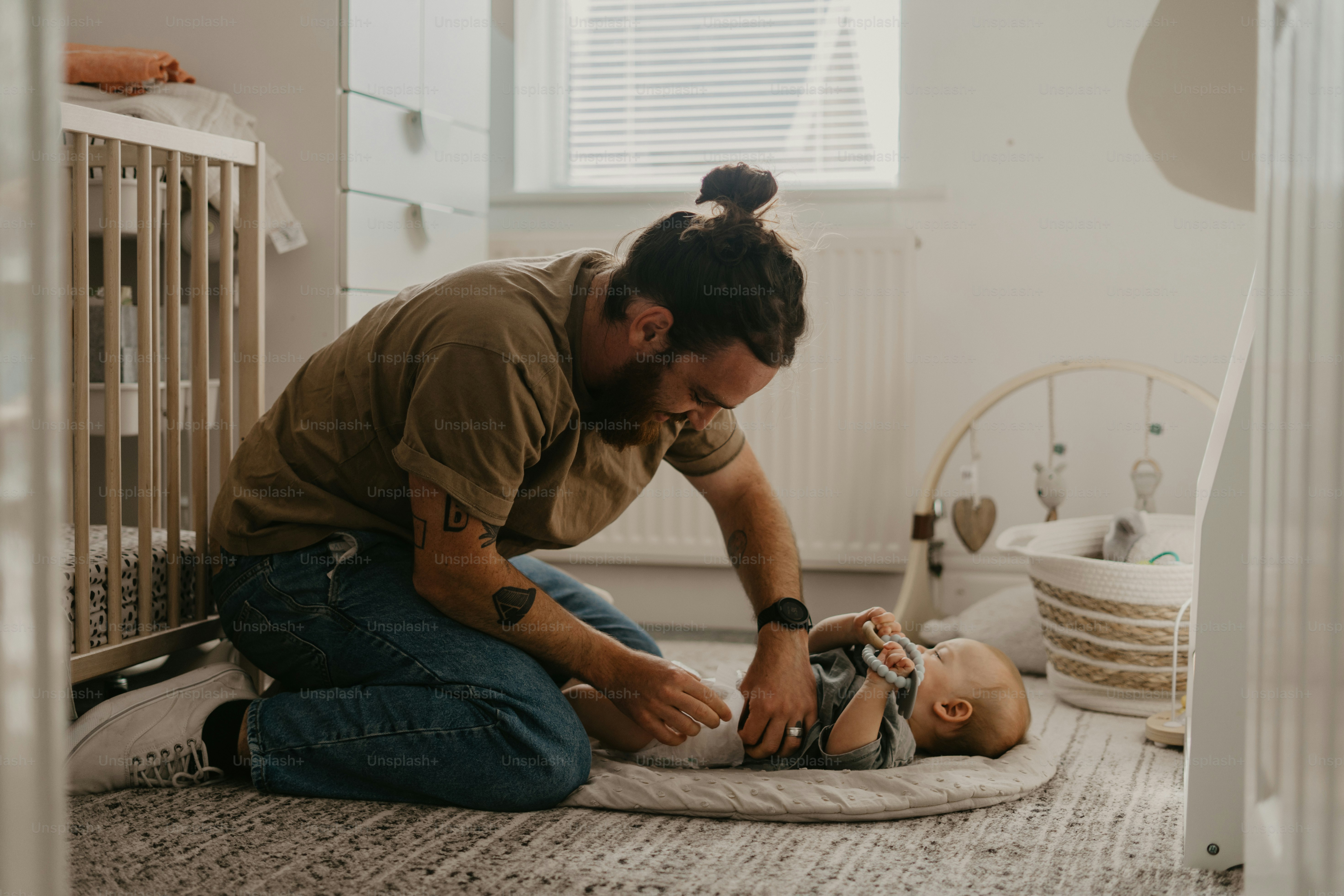 Father playing with baby