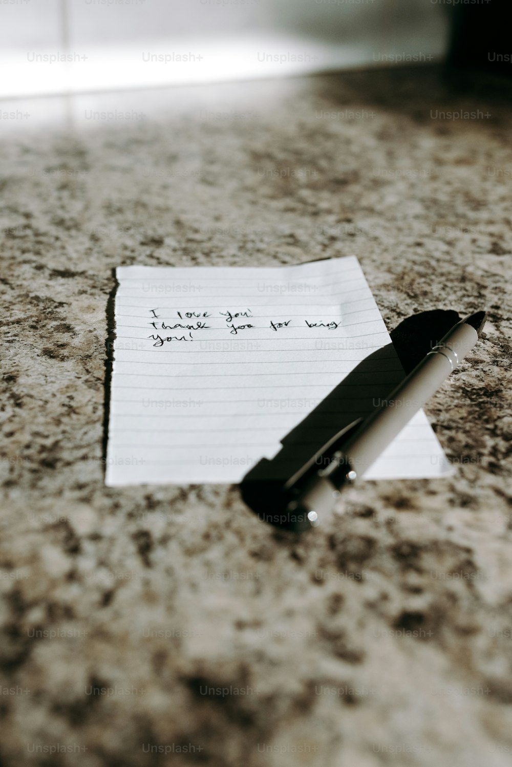a piece of paper sitting on top of a counter