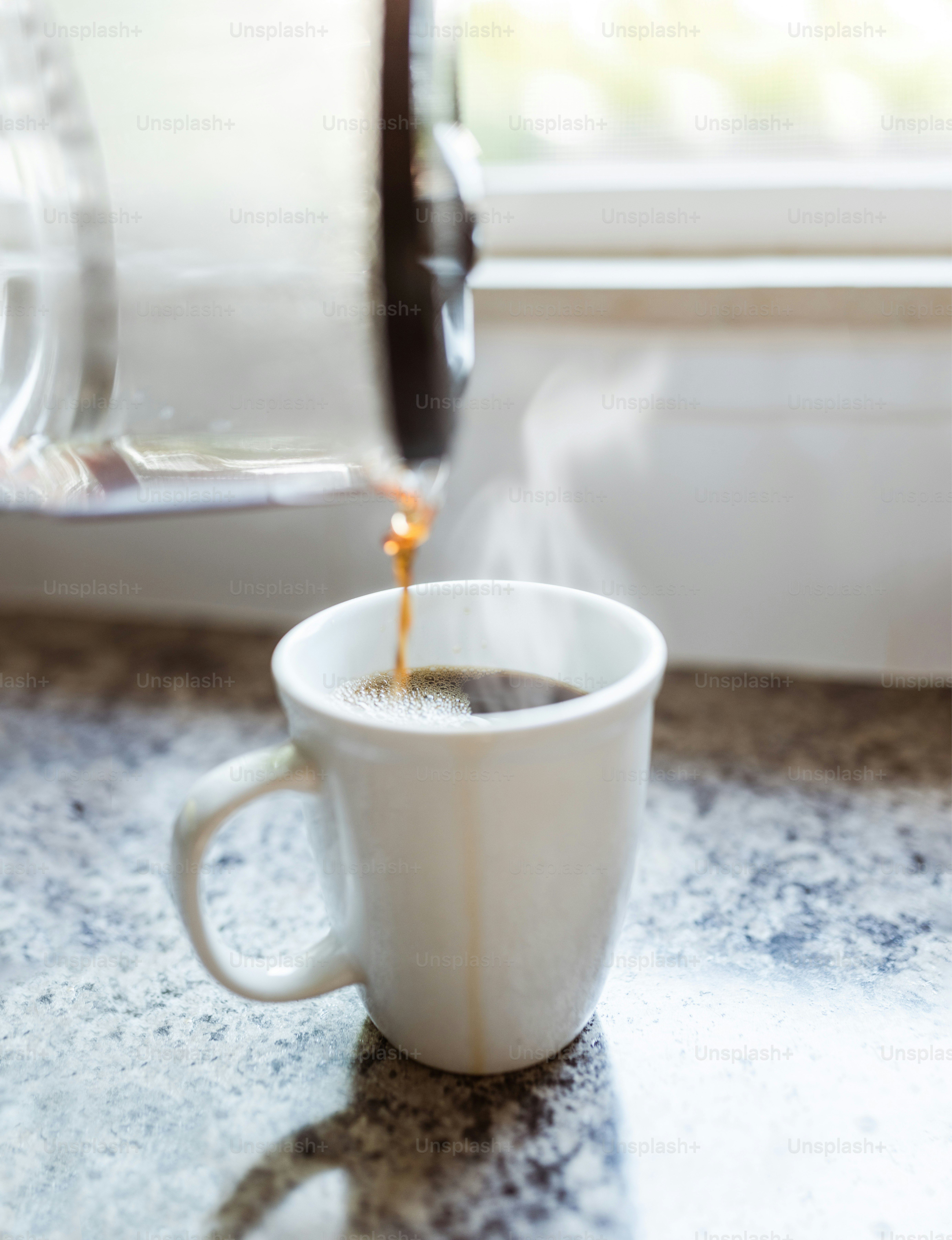 Modern kitchen setup featuring WiFi coffee makers brewing automatically in the morning